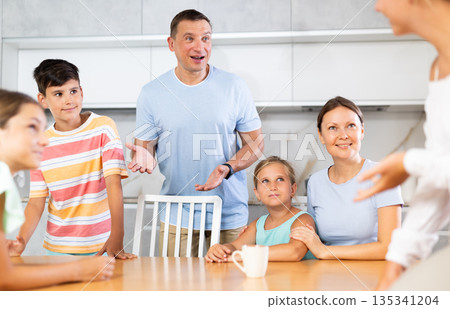 Big family discussing 135341204