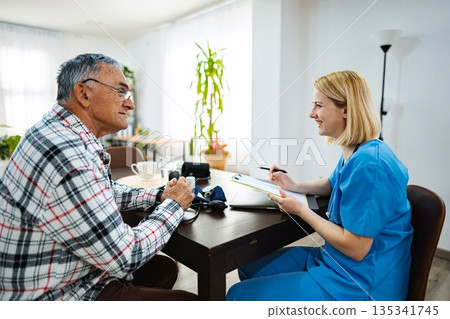 Caring conversation between nurse and patient in clinic Caring conversation between nurse and patient in clinic 135341745