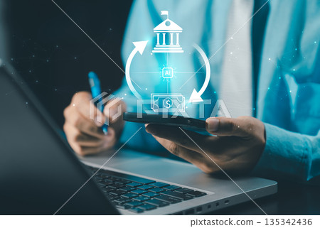 A businessman using a smartphone and laptop, with an overlay graphic showing an AI-powered financial transaction cycle between a bank/institution icon and a dollar/cash icon. 135342436