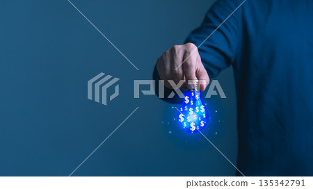 Person holding a blue light bulb with dollar signs symbolizing financial ideas, innovation uncertainty, small business, investment decisions, and creative business solutions. Person holding a blue light bulb with dollar signs symbolizing financial ideas, innovation uncertainty, small business, investment decisions, and creative business solutions. 135342791