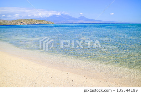 Beautiful view of white sand beach and blue sky 135344189