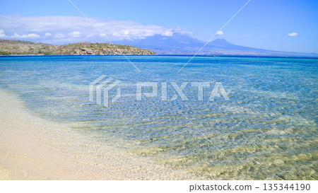 Beautiful view of white sand beach and blue sky 135344190