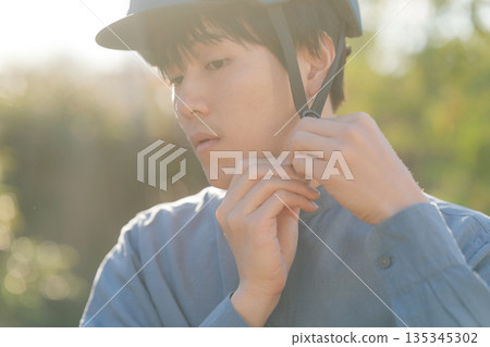 A man wearing a helmet A man wearing a helmet 135345302