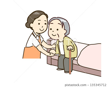 Elderly person getting up from bed and caregiver supporting them 135345712