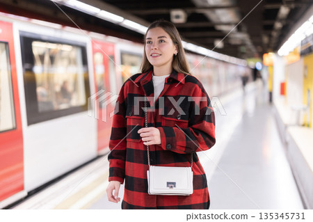 Woman changing to the subway 135345731