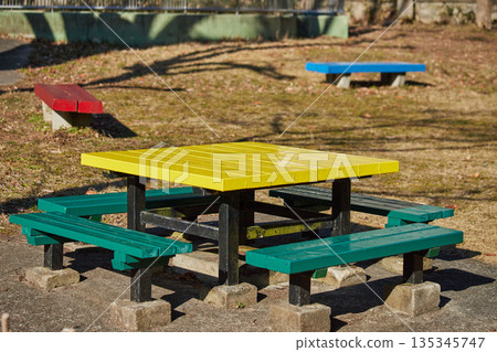 Chairs and tables in the park on a winter morning 135345747