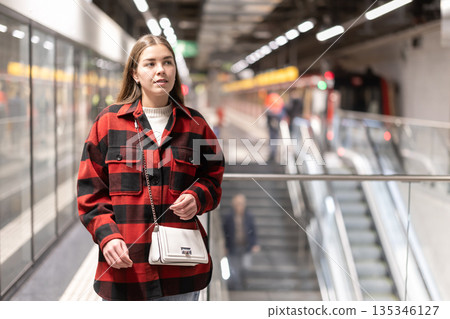 Woman changing to the subway 135346127
