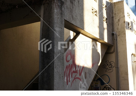 Old building wall with graffiti 135346346