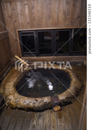 A rustic indoor bath A rustic indoor bath 135346519