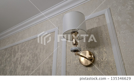 Trendy wallmounted light enhances entrance with sophisticated charm Trendy wallmounted light enhances entrance with sophisticated charm 135346629