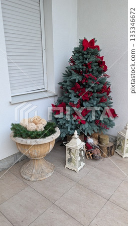 Ornamental holiday embellishments decorating entrance area 135346672