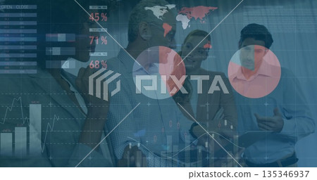 Analyzing team wearing suits examining financial data overlays on tablet in meeting room 135346937