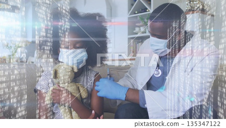 Child receiving vaccine injection from doctor on sofa in living room, with teddy bear and syringe Child receiving vaccine injection from doctor on sofa in living room, with teddy bear and syringe 135347122