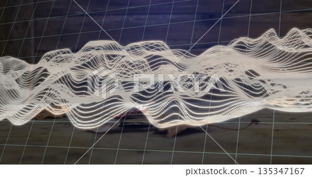 Floating 3D undulating wave pattern hovering in wooden workshop, with projected grid lines 135347167
