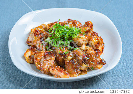 Stir-fried chicken thighs with green onions and ponzu sauce Stir-fried chicken thighs with green onions and ponzu sauce 135347582