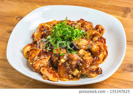 Stir-fried chicken thighs with green onions and ponzu sauce Stir-fried chicken thighs with green onions and ponzu sauce 135347625