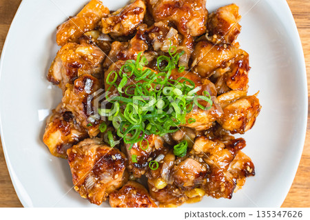 Stir-fried chicken thighs with green onions and ponzu sauce Stir-fried chicken thighs with green onions and ponzu sauce 135347626