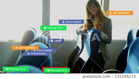 Businesswoman tapping smartphone in bus aisle by window with notification overlays, copy space Businesswoman tapping smartphone in bus aisle by window with notification overlays, copy space 135348214