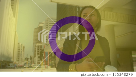 Holding smartphone, coffee cup and bag, businesswoman glancing under columns downtown, copy space Holding smartphone, coffee cup and bag, businesswoman glancing under columns downtown, copy space 135348279