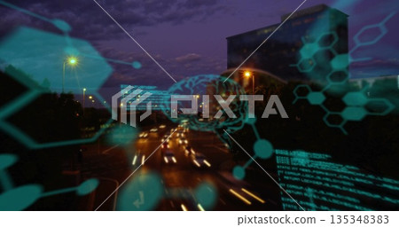 Displaying digital interface overlay over city highway at dusk, with hexagonal nodes, light trails Displaying digital interface overlay over city highway at dusk, with hexagonal nodes, light trails 135348383