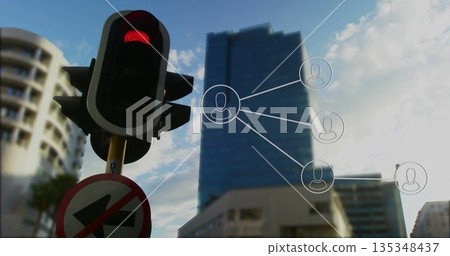 Displaying traffic signal red, no-left-turn sign at city intersection, network overlay, copy space Displaying traffic signal red, no-left-turn sign at city intersection, network overlay, copy space 135348437