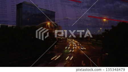 Streaming urban traffic creating light streaks on urban highway at night, with numeric code overlay Streaming urban traffic creating light streaks on urban highway at night, with numeric code overlay 135348479