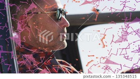 Mature man in aviator shades driving in car, gripping steering wheel, digital overlays, copy space Mature man in aviator shades driving in car, gripping steering wheel, digital overlays, copy space 135348515