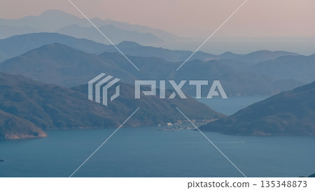 Serene Coastal Mountain Range Over Kau Sai Wan Serene Coastal Mountain Range Over Kau Sai Wan 135348873