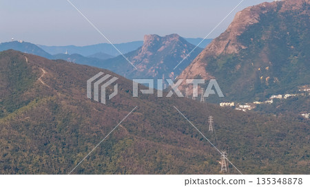 Mountain Range Landscape With Rolling Hills, Power Lines, hk Mountain Range Landscape With Rolling Hills, Power Lines, hk 135348878