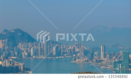 Jan 11 2026 Stunning Victoria Harbour Skyline View at Sunset Hong Kong Jan 11 2026 Stunning Victoria Harbour Skyline View at Sunset Hong Kong 135348892