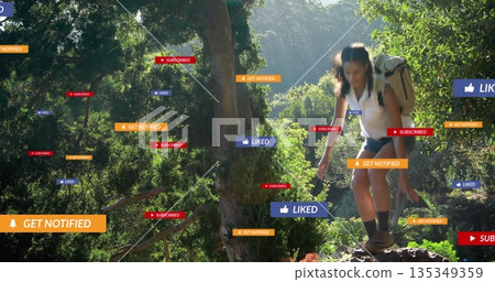 Climbing hiker carrying backpack up ledge on trail with floating notification labels, copy space Climbing hiker carrying backpack up ledge on trail with floating notification labels, copy space 135349359