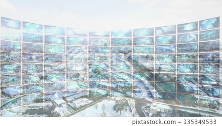 Displaying curved monitor wall projecting binary code and globes in control room over snowy suburb Displaying curved monitor wall projecting binary code and globes in control room over snowy suburb 135349533