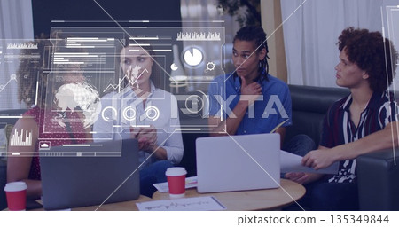 Analyzing data team sitting around table at office lounge, with laptops, dashboard overlay Analyzing data team sitting around table at office lounge, with laptops, dashboard overlay 135349844
