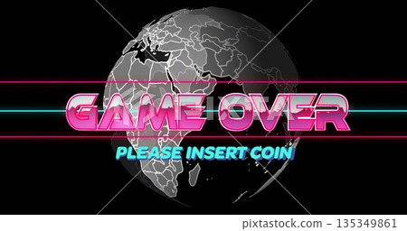 Displaying neon pink GAME OVER text with turquoise stripes over globe on black arcade screen 135349861