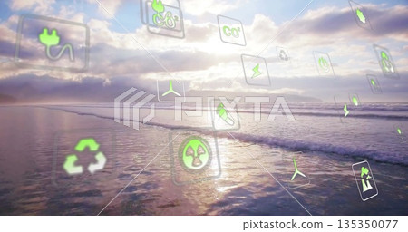Floating digital icons hovering above shoreline at low tide with renewable and recycling symbols Floating digital icons hovering above shoreline at low tide with renewable and recycling symbols 135350077