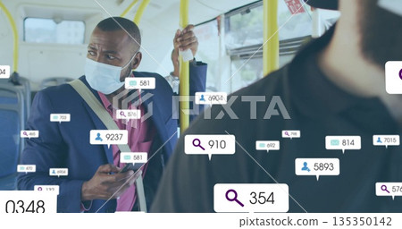 Holding smartphone, Black man wearing face mask gripping handrail on bus, with icons, copy space Holding smartphone, Black man wearing face mask gripping handrail on bus, with icons, copy space 135350142