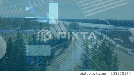 Displaying winding paved road cutting through dense conifer forest by lake, with data overlays Displaying winding paved road cutting through dense conifer forest by lake, with data overlays 135350174