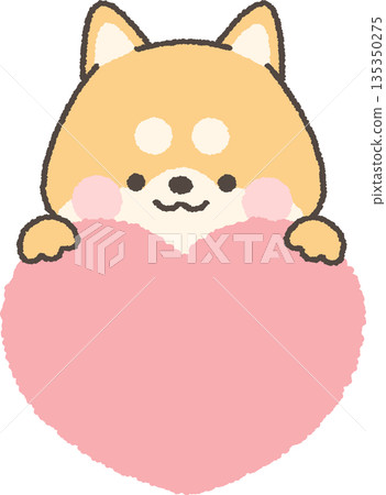 A brown Shiba Inu peeking out from above the heart 135350275