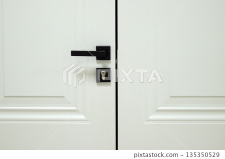 closed door of a white room closed door of a white room 135350529