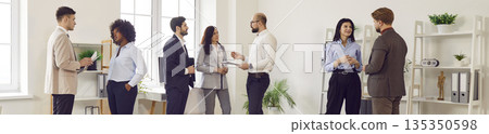 Business Team Communication At Office Meeting 135350598