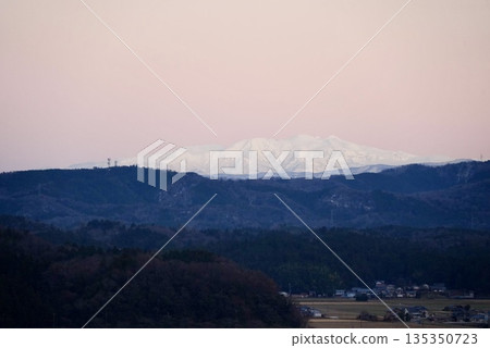 A mountain stained in the sunset 135350723