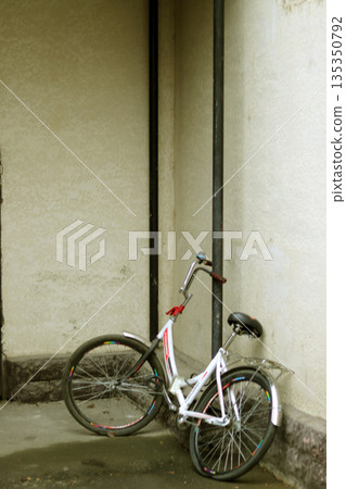 red bicycle on the street red bicycle on the street 135350792