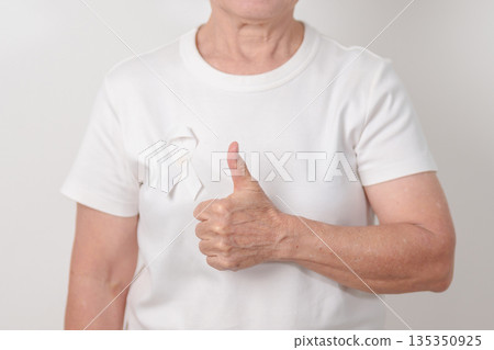 Elderly with White ribbon for concept November Lung Cancer Awareness month, Stop Violence Against Women, Adoption, May Retinoblastoma, Action for Women Health, March Remembrance, October Osteoporosis Elderly with White ribbon for concept November Lung Cancer Awareness month, Stop Violence Against Women, Adoption, May Retinoblastoma, Action for Women Health, March Remembrance, October Osteoporosis 135350925