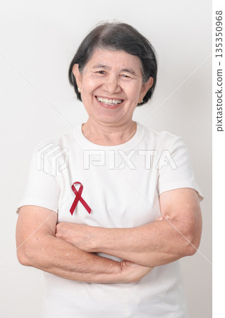 Elderly with Burgundy Ribbon for March Multiple Myeloma Cancer Awareness month, September Sickle Cell Anemia, Headache and Migraine week, April world Meningitis day, October Hospice Palliative care Elderly with Burgundy Ribbon for March Multiple Myeloma Cancer Awareness month, September Sickle Cell Anemia, Headache and Migraine week, April world Meningitis day, October Hospice Palliative care 135350968
