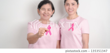 Couple woman with pink Ribbon for Pink October Breast Cancer Awareness month, May Women Health, November Birth Parents Adoption, women rights, Empowerment, March International Women day and Cancer day Couple woman with pink Ribbon for Pink October Breast Cancer Awareness month, May Women Health, November Birth Parents Adoption, women rights, Empowerment, March International Women day and Cancer day 135351347