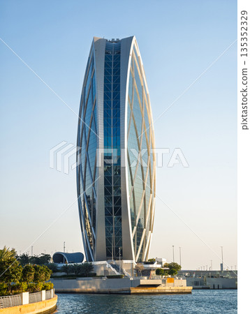 Abu Dhabi, United Arab Emirates - January 3, 2026: Aldar Headquarters Circular Skyscraper in Abu Dhabi 135352329