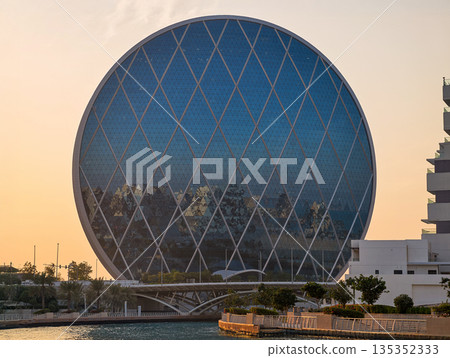 Abu Dhabi, United Arab Emirates - January 10, 2026: Aldar Headquarters Circular Skyscraper in Abu Dhabi Abu Dhabi, United Arab Emirates - January 10, 2026: Aldar Headquarters Circular Skyscraper in Abu Dhabi 135352333