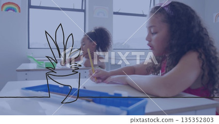 Writing child in pink sleeveless top using yellow pencil on desk in classroom, copy space 135352803