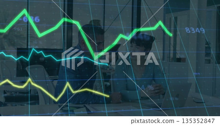 Reviewing metrics two colleagues analyzing laptop in open office, with neon line charts 135352847