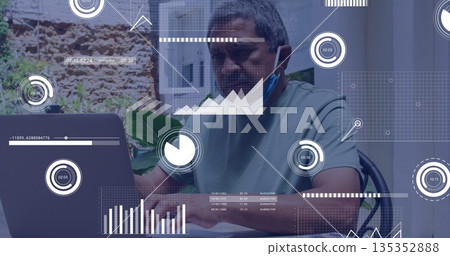 Analyzing senior man using laptop at patio table on metal chair, with coffee mug and plants 135352888